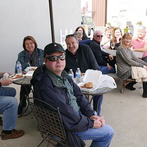 People enjoying the wonderful food truck offerings...