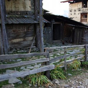 Bhutan - sheds attached to a rural farmhouse