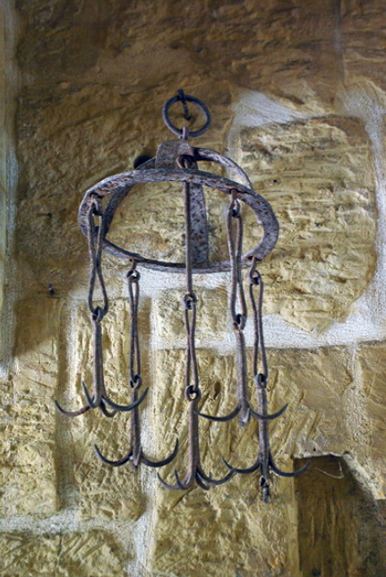 Grappling iron usedl to retrieve a lost bucket, Gharb Folklore Museum