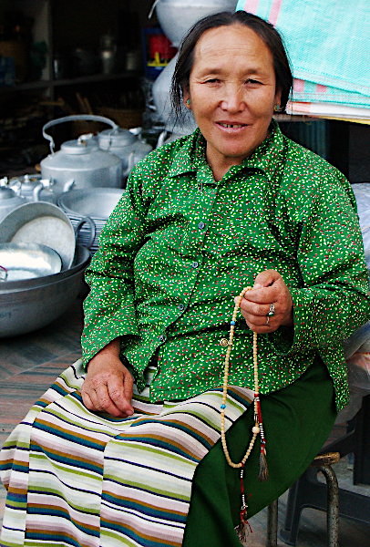 We saw this lady sitting outside a shop in Thimphu, who wanted her picture taken