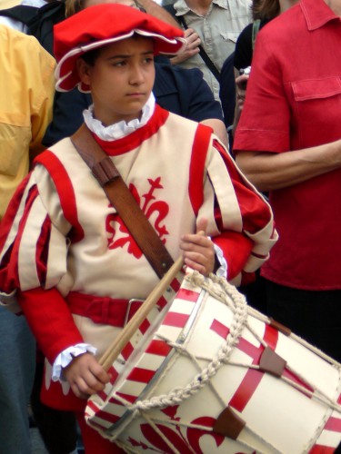 Young Drummer Announces the Cart's Arrival