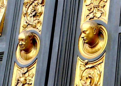 Lorenzo and Vittorio Ghiberti stare out from their Doors of Paradise