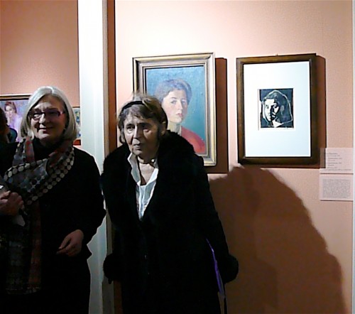 Curator Giovanna Giusti with Tinca Stegovec by two of the artist's works