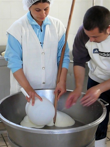 After "stringing" pieces of mozzarella are carved off to form balls