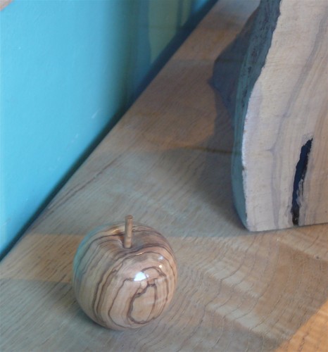 An apple made of palisander wood.